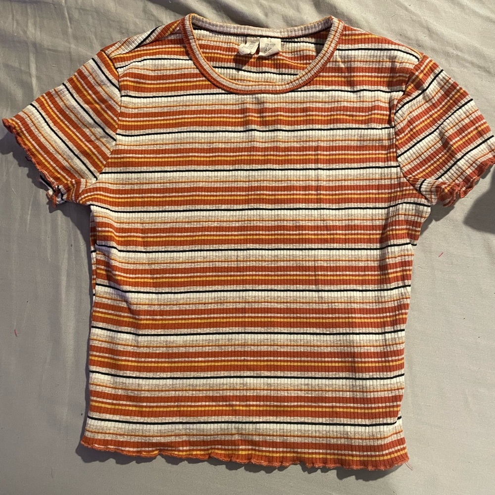 This is a size small from Sky and Sparrow, stripped warm color crop top.